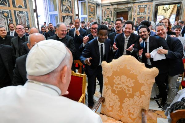 Pope Francis shares a moment with comedians.